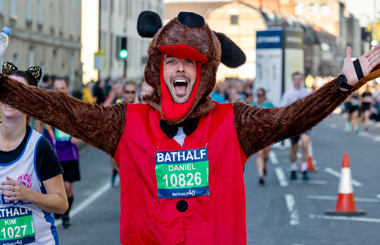 Man in dog costume during Bath Half marathon c Anna Barclay 
