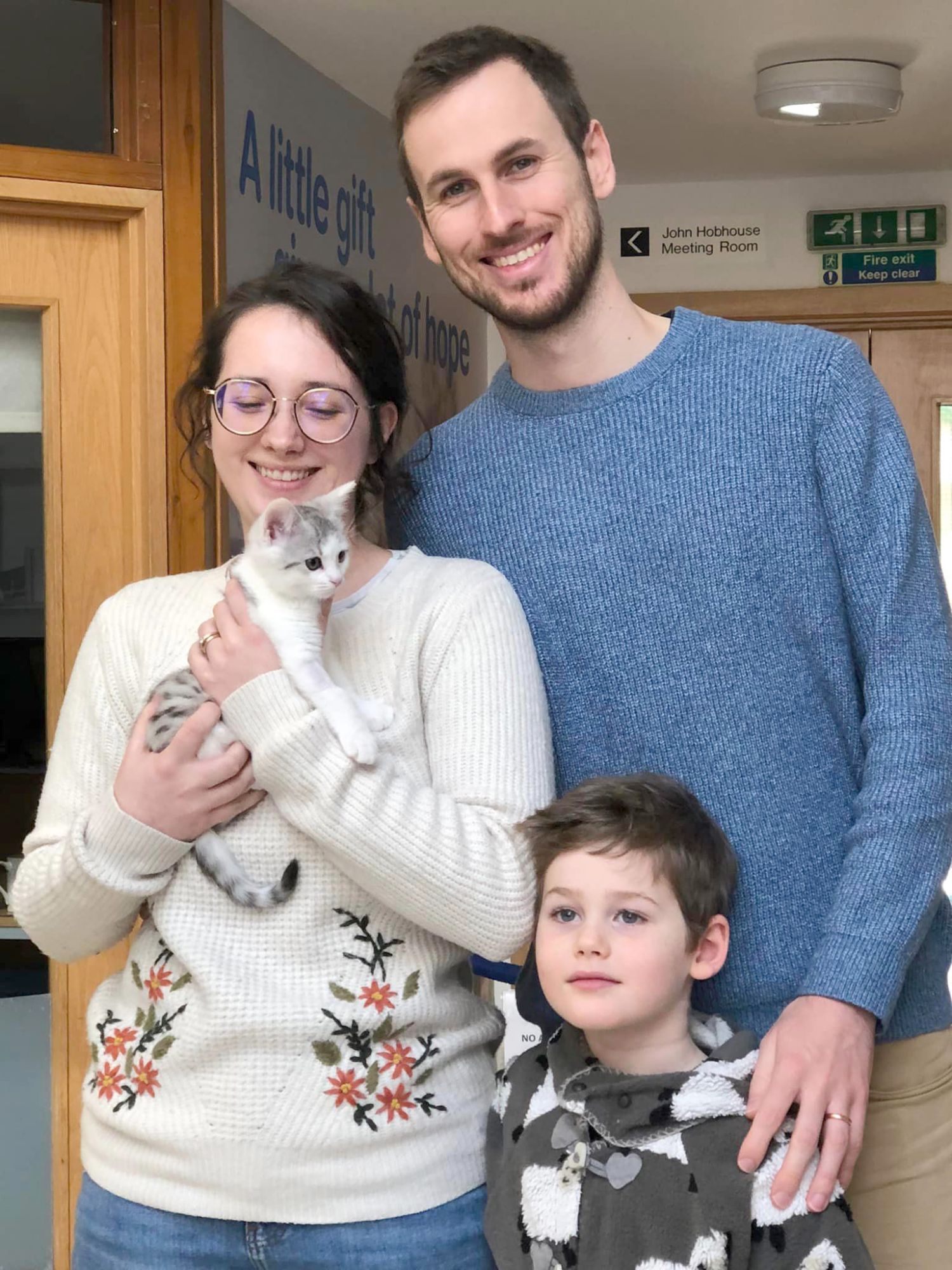 Family with adopted kitten